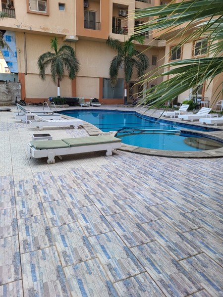 Hurghada-Immobilie mit Green-Vertrag. Möblierte 1BD-Wohnung in Anlage mit Pool in Al Ahyaa