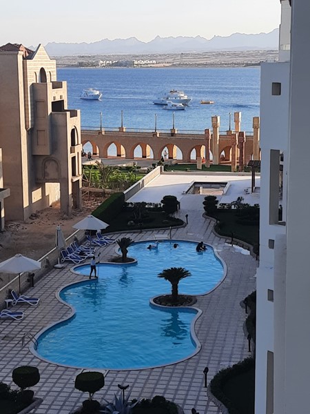 Sea & pool view, modern furnished & equipped 2BD apartment for sale in El Andalous Sahl Hasheesh