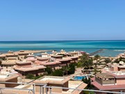 Side sea view, furnished & equipped 1BD for sale in Al Ahya, front of Turtles Beach Resort Hurghada