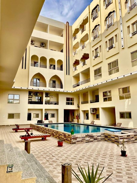 Hot offer! Light full 1BD apartment for sale in Hurghada, Kawther area. Swimming pool, green contrac