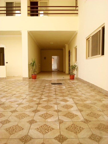 2 bedrooms flat for sale in compound with pool near Bowling Kauser. 