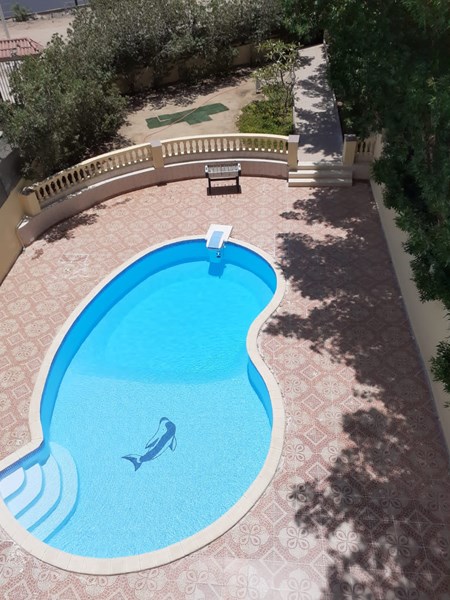 half villa in Mubarak 6, without furniture, private pool, garden